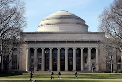 In this April 3, 2017, file photo, students walk past the 'Great Dome' atop Building 10 on the Massachusetts Institute of Technology campus in Cambridge, Mass.