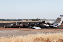 The burned out remains of a twin-engine Cessna Citation sits at the end of a runway after the pilot aborted the takeoff at the Oroville Airport in Oroville, Calif., Wednesday, Aug. 21, 2019. The plane carried two pilots and eight passengers, who all escaped injury. Firefighters were able to quickly control a grass fire that broke out and temporarily closed Highway 162. No cause of the crash has been listed.