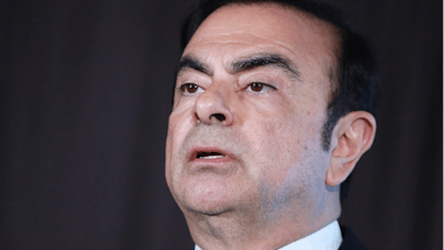 In this May 12, 2016, photo, then-Nissan Motor Co. President and CEO Carlos Ghosn speaks during a press conference in Yokohama.