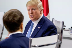 French President Emmanuel Macron, left, and President Donald Trump, right, participate in a G-7 Working Session in Biarritz, France, Sunday, Aug. 25, 2019.