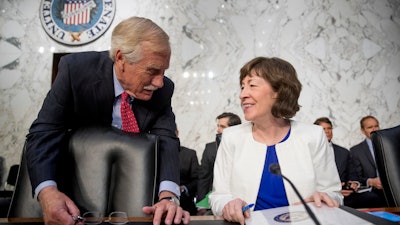 Sen. Angus King, I-Maine, left, speaks with Sen. Susan Collins, R-Maine, on Capitol Hill, June 20, 2018.