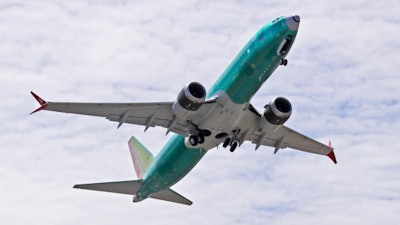 In this May 8, 2019, file photo, a Boeing 737 MAX 8 jetliner being built for Turkish Airlines takes off on a test flight in Renton, Wash. Boeing says it has finished with its updates to the flight-control software implicated in two deadly crashes involving its 737 Max, moving a step closer to getting the plane back in the sky.