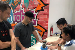 Electrical engineer Alex Starick, production material fabricator Yaniel Ruiz, operations director Chi To So and senior R&D engineer Ash Nanakayya with a Gecko Gripper sub-assembly, Culver City, Calif.