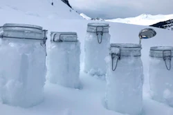 This undated photo provided by the 'Helmholtz centre for polar and marine research the Alfred Wegener institute' shows snow samples from Tschuggen, Switzerland, locked and ready for transport to Davos. Scientists of the institute say they proved plastic in the snow of the Alps and the Arctic.