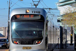 In this Jan. 16, 2016, file photo, a Metro Light Rail train stops for passengers in Phoenix.