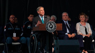 Gov. Greg Abbott speaks during a memorial service for the victims of the Aug. 3 mass shooting, Wednesday, Aug. 14, 2019, at Southwest University Park in El Paso.