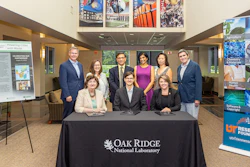 Seated are Michelle Buchanan, ORNL deputy for science and technology; Alex Lewis, CEO of Electro-Active Technologies; and Stacey Patterson, University of Tennessee Research Foundation president, who signed the licensing agreement for two ORNL microbial electrolysis technologies. Standing, from left, are Mike Paulus and Jennifer Caldwell of ORNL; Abhijeet Borole of Electro-Active Technologies; Maha Krishnamurthy of UTRF; and Edna Gergel and Brian Davison of ORNL.