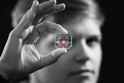 Rachel Young, a graduate student in Huh's lab, holds up their new eye-on-a-chip device. The latest iteration of the lab's eye-on-a-chip has a mechanical eyelid to simulate blinking, and was used to test an experimental drug for dry eye disease. By incorporating human cells into an engineered scaffolding, the eye-on-a-chip has many of the benefits of testing on living subjects, while minimizing risks and ethical concerns.