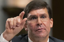 In this July 16, 2019, photo, Secretary of the Army and Secretary of Defense nominee Mark Esper testifies before a Senate Armed Services Committee confirmation hearing on Capitol Hill.