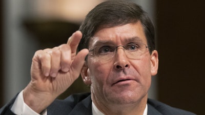 In this July 16, 2019, photo, Secretary of the Army and Secretary of Defense nominee Mark Esper testifies before a Senate Armed Services Committee confirmation hearing on Capitol Hill.