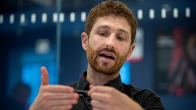 Tristan Harris, former design ethicist at Google and co-founder of the Center for Humane Technology, speaks to The Associated Press during a round-table discussion on Tuesday, July 30, 2019, in New York. Harris says he's concerned about people's addiction to technology, thanks to tools that major technology companies employ to persuade people to spend more time on their services.