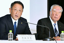 In this Oct. 12, 2016 file photo, Toyota Motor Corp. President Akio Toyoda, left, speaks with Suzuki Motor Corp. Chairman Osamu Suzuki during a news conference in Tokyo. Japan's top automaker, Toyota, and smaller rival Suzuki announced Wednesday, Aug. 28, 2019, they are partnering in the development of self-driving car technology, as manufacturers around the world grapple with innovations in the industry.