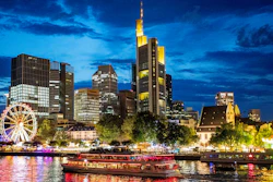 A party ship cruises on the river Main during the Mainfest event in Frankfurt, Germany, late Friday, Aug. 2, 2019.