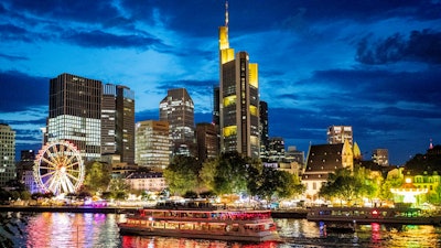 A party ship cruises on the river Main during the Mainfest event in Frankfurt, Germany, late Friday, Aug. 2, 2019.