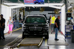 In this June 24, 2019, file photo Ford's employees work on a Lincoln Aviator line at Ford's Chicago Assembly Plant in Chicago's Hegewisch neighborhood. On Thursday, Aug. 15, the Federal Reserve reports on U.S. industrial production for July.