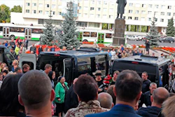 In this grab taken from a footage provided by the Russian State Atomic Energy Corporation ROSATOM press service, people gather for the funerals of five Russian nuclear engineers killed by a rocket explosion in Sarov, the closed city, located 370 kilometers (230 miles) east of Moscow, Monday, Aug. 12, 2019. Thousands of people have attended the burial of five Russian nuclear engineers killed by an explosion during tests of a new rocket. The engineers, who died on Thursday, were laid to rest Monday in the city of Sarov that hosts Russia’s main nuclear weapons research center.