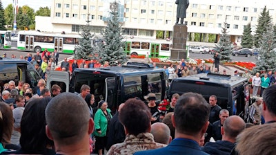 In this grab taken from a footage provided by the Russian State Atomic Energy Corporation ROSATOM press service, people gather for the funerals of five Russian nuclear engineers killed by a rocket explosion in Sarov, the closed city, located 370 kilometers (230 miles) east of Moscow, Monday, Aug. 12, 2019. Thousands of people have attended the burial of five Russian nuclear engineers killed by an explosion during tests of a new rocket. The engineers, who died on Thursday, were laid to rest Monday in the city of Sarov that hosts Russia’s main nuclear weapons research center.