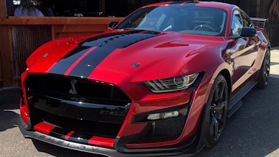 In this Tuesday, July 31, 2019, photo the the 2020 Shelby GT500 is displayed during a Ford press conference in the Detroit suburb of Clawson, Mich. The Mustang will be the most powerful street-legal Ford Mustang ever built and will go on sale this fall.