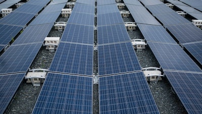 Solar panels installed by Tesla power a community of 12 homes in Las Piedras, Puerto Rico, July 20, 2018.