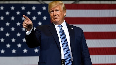 President Donald Trump arrives to speaks Tuesday, Aug. 13, 2019, during a visit to Shell's soon-to-be completed Pennsylvania Petrochemicals Complex in Monaca, Pa.