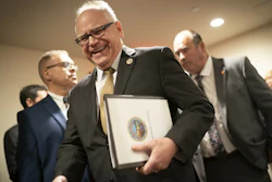 Gov.-elect Tim Walz walking in to a press conference at the State Capitol in St. Paul, Minn., Tuesday, Dec. 18, 2018.