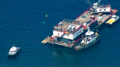 This photo from video provided by KABC-TV shows divers resuming their search for the final missing victim who perished in a boat fire off the Southern California coast Wednesday, Sept. 11, 2019. The victim is one of 34 who died at sea last week near Santa Cruz Island when the dive boat Conception burned and sank on Sept. 2. Santa Barbara County Sheriff's Lt. Erik Raney says salvage efforts to recover the Conception also resumed Wednesday.