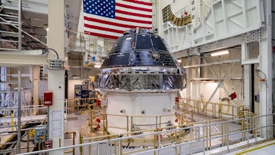 The Orion crew capsule undergoes preparations for the first Artemis lunar mission, June 2019.