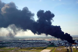 In this March 18, 2019, file photo, a plume of smoke rises from a petrochemical fire at the Intercontinental Terminals Company in Deer Park, Texas.