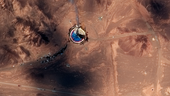 This satellite image from Maxar Technologies shows a fire at a rocket launch pad at the Imam Khomeini Space Center in Iran's Semnan province, Thursday, Aug. 29, 2019.