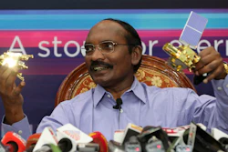 In this Aug. 20, 2019, file photo, Indian Space Research Organization Chairman Kailasavadivoo Sivan displays a model of Chandrayaan 2 orbiter and rover during a press conference at their headquarters in Bangalore.