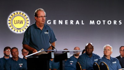 In this July 16, 2019, file photo, United Auto Workers President Gary Jones speaks during the opening of their contract talks with General Motors in Detroit.