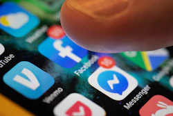 In this Aug. 11, 2019, file photo, an iPhone displays the apps for Facebook and Messenger in New Orleans.