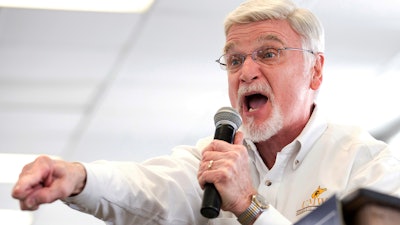 In this March 11, 2018, file photo, Cecil Roberts, president of United Mine Workers of America, speaks at the Greene County Fairgrounds in Waynesburg, Pa.