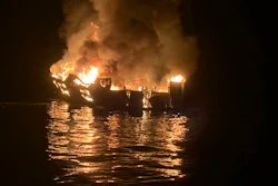 In this Sept. 2, 2019, file photo, a dive boat is engulfed in flames off the Southern California Coast.