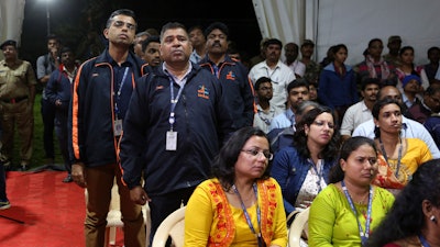 Indian Space Research Organization employees react to an announcement by agency chief Kailasavadivoo Sivan at its Telemetry, Tracking and Command Network facility in Bangalore, Sept. 7, 2019.