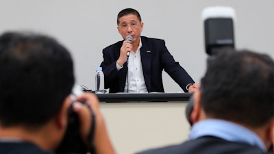 Nissan Chief Executive Hiroto Saikawa speaks during a press conference in the automaker's headquarters in Yokohama, Monday, Sept. 9, 2019.