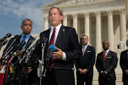 Texas Attorney General Ken Paxton speaks to reporters in front of the U.S. Supreme Court in Washington, Sept. 9, 2019.