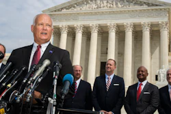 Nebraska Attorney General Doug Peterson speaks to reporters in front of the U.S. Supreme Court in Washington, Monday, Sept. 9, 2019.