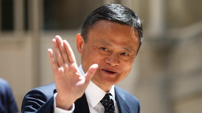 In this May 15, 2019, file photo, founder of Alibaba group Jack Ma arrives for the Tech for Good summit in Paris.