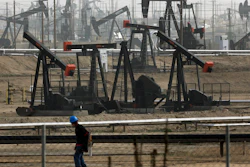 This Jan. 16, 2015, file photo shows pumpjacks operating at the Kern River Oil Field, in Bakersfield, Calif.