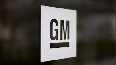 This May 16, 2014, file photo shows the General Motors logo at the company's world headquarters in Detroit.