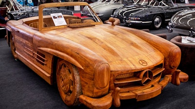 A Mercedes 300 SL Gullwing Roadster made of Teak wood displayed at the IAA Auto Show in Frankfurt, Germany, Wednesday, Sept. 11, 2019.
