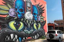 This Wednesday, Sept. 11, 2019 photo shows a mural painted Jeff Soto and Maxx Gramajo in Detroit.