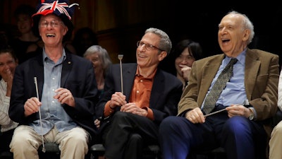 From left, Nobel Laureates Rich Roberts (Medicine, 1993), Eric Maskin (Economics, 2007), and Jerome Friedman (Physics, 1990) during the 29th annual Ig Nobel awards ceremony at Harvard University, Sept. 12, 2019, in Cambridge, Mass.