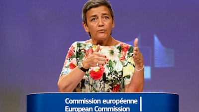 In this July 18, 2019, file photo, European Antitrust Commissioner Margrethe Vestager talks during a news conference in Brussels.