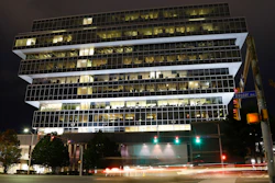 In this Sept. 12, 2019, file photo, cars pass Purdue Pharma headquarters in Stamford, Conn.