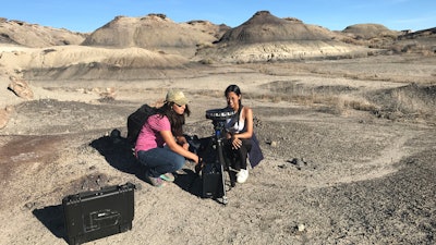 Filmmakers Carmile Garcia, left, and Kayla Briet use a 360 VR video rig cameras in Bisti/De-Na-Zin Wilderness area in New Mexico, Oct. 24, 2017.
