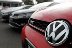 Display cars are parked at a Volkswagen dealership in Sydney, Monday, Sept. 16, 2019.