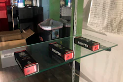 In this Aug. 28, 2019, photo, boxes of what appear to be Kingpen marijuana vape cartridges are displayed in an illegal dispensary in Los Angeles that was shut down by police.