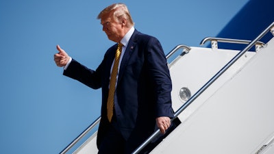 President Donald Trump arrives at Moffett Federal Airfield to attend a fundraiser, Tuesday, Sept. 17, 2019, in Mountain View, Calif.